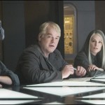 Effie-Plutarch-coin-Gale-cop