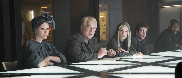 Effie-Plutarch-coin-Gale-cop